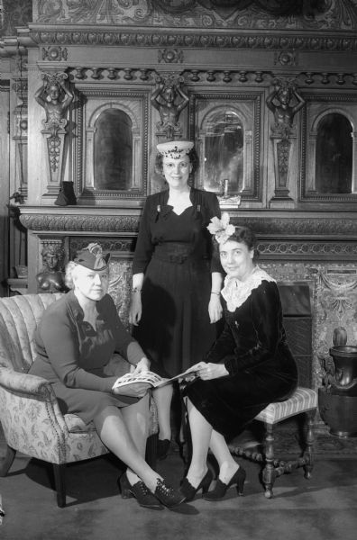 Group portrait of three members of the Zonta International Club, a classified service club for executive women, taken at an inter-city meeting held at the College Club. From left to right: Miss Ann Schmich and Mrs. Charles J. Allen, members of the Madison chapter, and Mrs. Hazel Stephenson, Chicago chapter.