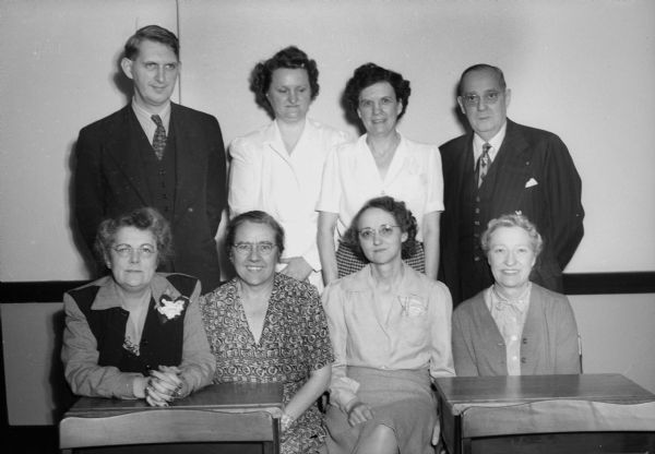 Members of the vocational school Christmas Seal work committee, and the departments they represent, are, left to right, (back row), Herbert Zindars, Trade and Industry; Lillian Miller, Home Economics; Emily Hand, Commercial; Alexander R. Graham, Director. (Front row), Mrs. Florence Baskerville, Accademic; Mrs. Vesta Fuller, Art; Mrs. Marguerite Baker, Commercial; and Wilhelmena Rentz, Office Force.