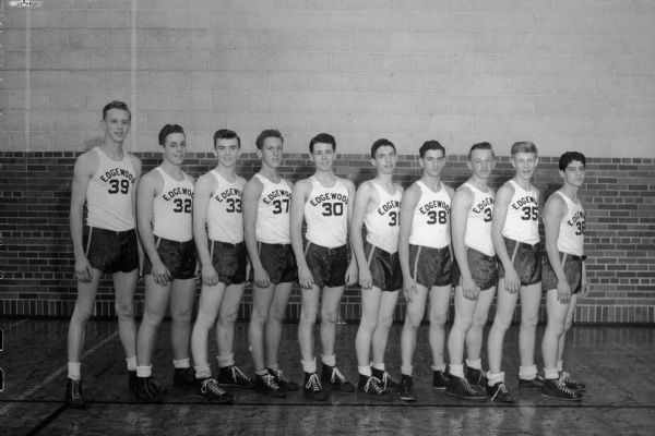 Edgewood High School basketball team. Group portrait of ten players in uniform.