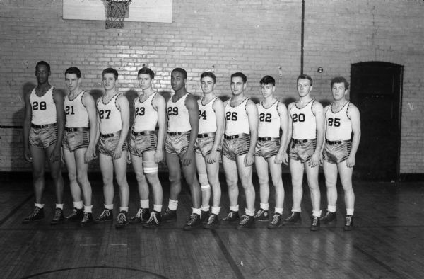 Central High School basketball team. Group portrait of ten players in uniform.