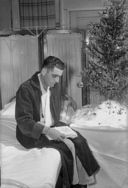 Staff Sergeant Johnnie White celebrating Christmas at Truax Field hospital.