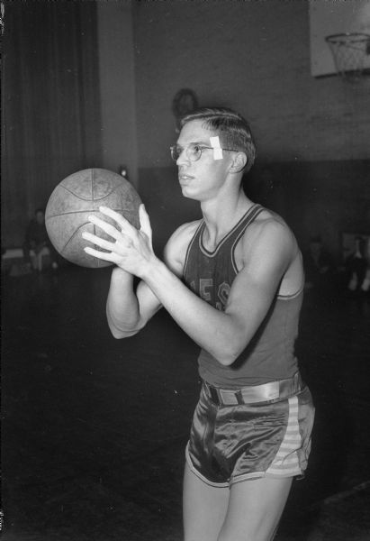 Don Page, all-time individual Big Eight Conference scoring record holder. The six-foot 3-inch high school center broke his own record with a total of 167 points in Conference play.