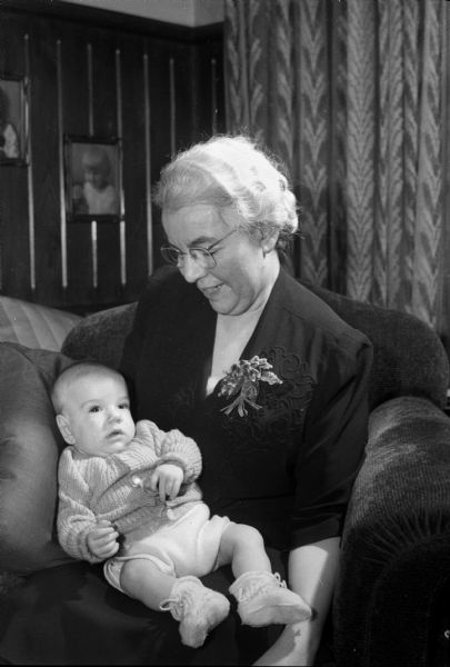 Mrs. H.W. (Margaret) March holding her grandson, Frederick Lange.