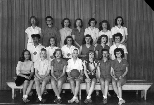 Group portrait of women's basketball team.