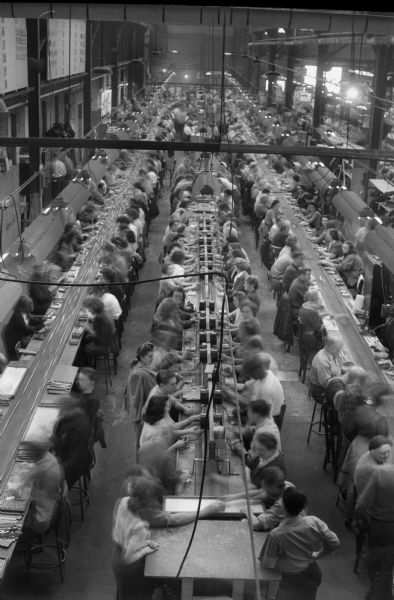 RMR (Ruben-Mallory-Ray-O-Vac) factory floor showing workers making batteries.
