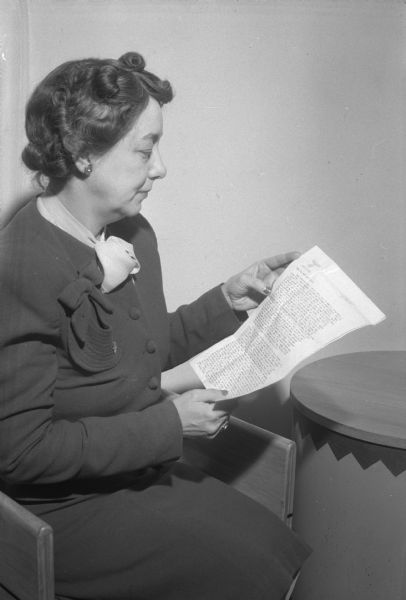 Mrs. Aline W. Hazard, mother of Pfc. William R. Hazard, holding a letter from her son written on personal stationery of Adolph Hitler. He was with the first group of GI's to enter Hitler's Munich home.