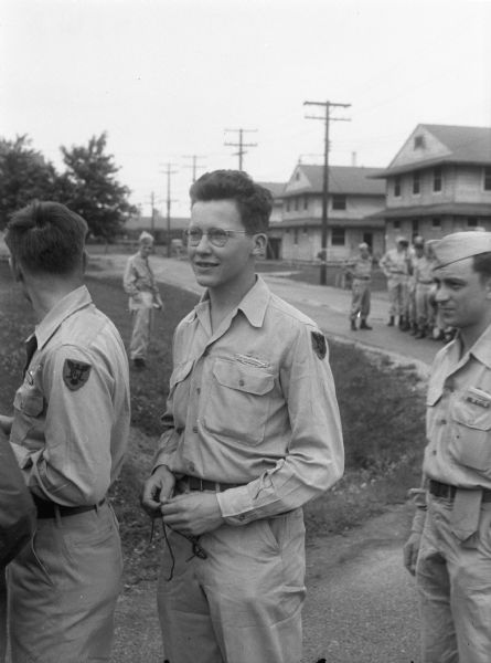 Pfc. Howard A. Endres standing in line for his final meal at Camp Grant, Rockford, Illinois, before being discharged at the end of World War II.