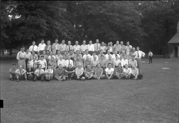 Group portrait of RMR employees at a picnic.