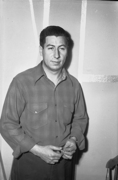 Leonard Forrest, bartender and son of owner of Laurel Tavern, 2505 Monroe Street. Two black-masked bandits armed with a gun and a black jack escaped with $2,000 in checks and cash from the Laurel Tavern after taking Leonard Forrest from his home at gunpoint and forcing him to open a safe in the tavern.