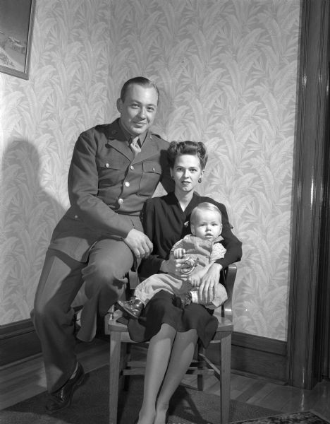 Accused bigamist, June Benson, shown with her current husband, Corporal Robert Benson, and her son Chucky.