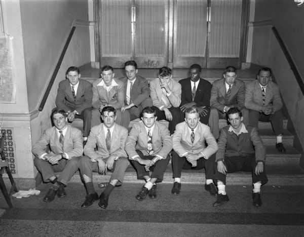 Group portrait of Zor Shrine All-City high school football team, left to right, top row: Duane Sydow, East High; Jim Toepfer, East High; Bob Johnson, West High; Bill Wallmo, Wisconsin High; Al Dockery, Central High; Ken Sachtjen, East High; Al Werndili, East High; front row, l.to r.: Tom and Bob McCormick, Edgewood High; Art Johnson, Edgewood High; Bill Piper, West High; Harry Gilbert, West High.