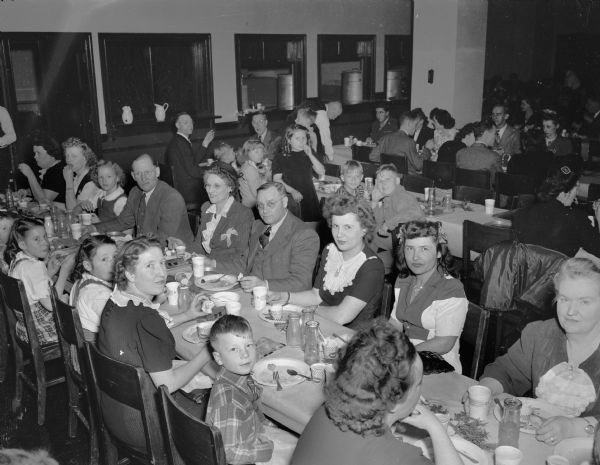 Family members of Scanlon-Morris employees, seated for a dinner party.
(Scanlon-Morris medical equipment Company)