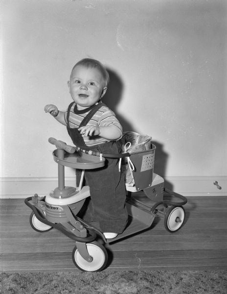 Robert W. Kleinheinz in a stroller when he was one year old.  He was born on December 31, 1944, and his parents are William J. and Lucille Kleinheinz, 1023 South Park Street.