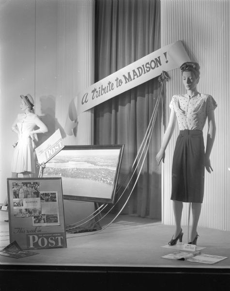 Manchester's show window titled "A Tribute to Madison" and featuring pages from the <I>Saturday Evening Post</I> article about Madison being a "miniature model of the ideal America", January 5, 1946 issue.