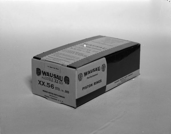 Box of Wausau Motor Parts Company piston rings, taken for Brock Engraving Company.