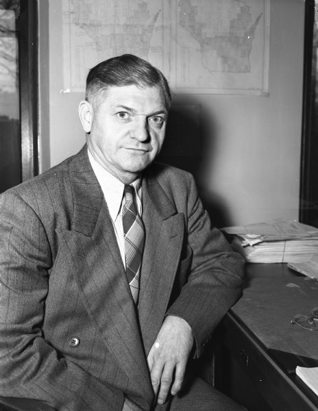 Portrait of Arthur J. Homann, State Director of Crop Insurance.