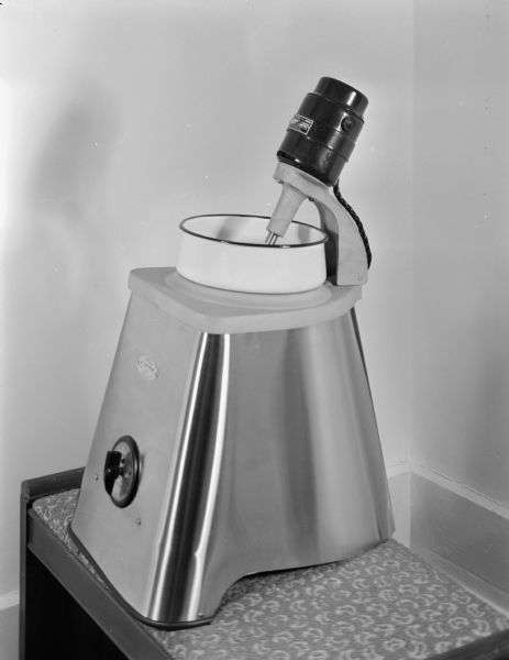 Tabletop mixing machine, taken for R.L. Kulzick Advertising Agency, 113 East Main Street.