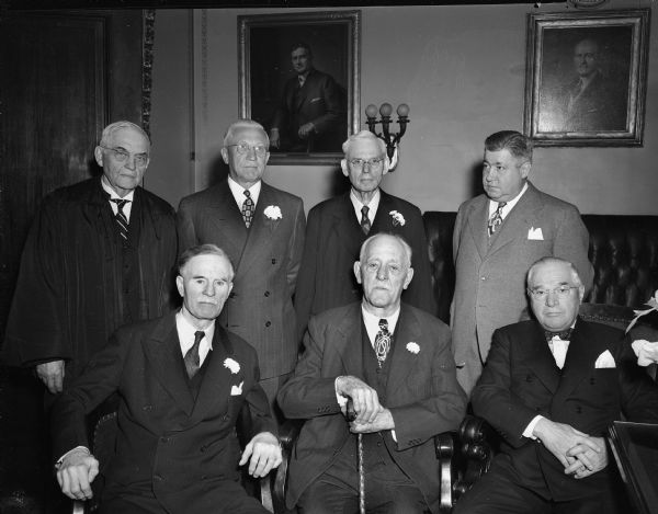 Pictured at the inauguration of state officers in the Wisconsin State Capitol are, front row from left: Secretary of State Fred R. Zimmerman, Governor Walter S. Goodland who is beginning his third term, and Julius Heil, a former governor.  Second row from the left:  State Supreme Court Chief Justice Marvin B. Rosenberry, Lieutenant Governor Oscar Rennebohm, State Treasurer John Smith, and Attorney General John E. Martin.