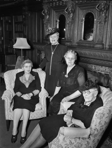 Included in the group portrait taken at the 50th anniversary luncheon of the founding of the Gudrid Reading circle are, from the left:  Mrs. Juliue E. (Anna) Olson; Mrs. Aad J. Vinje; Mrs. L.A. (Margrethe) Anderson; and Mrs. Emil (Dora) Rasmussen.  The Gudrid is a literary organization made up of women of Scandinavian ancestry who study Scandinavian and English literature.