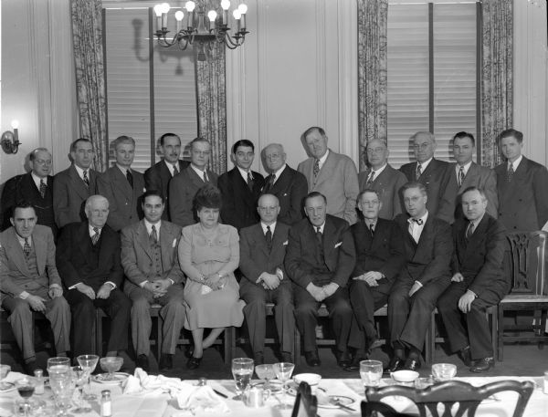 Group portrait of twenty men and one woman, staff of the American Cancer Society, Wisconsin Division.