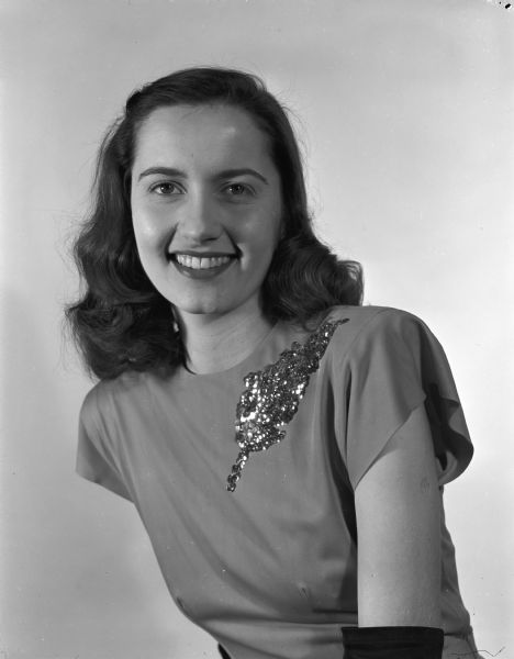 Portrait of Alberta Baxter, one of six women in the court for the University of Wisconsin Junior Prom. Pictured in five negatives of University of Wisconsin Junior prom court are: Beverly Sidie, Ruth Schmitt, Pamela Parsons, Bette Lami, and Virginia Freund.