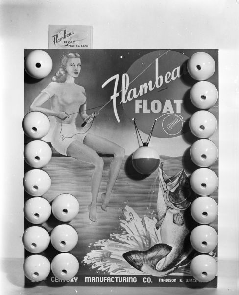 Advertisement for Flambeau Float, 20th Century Manufacturing Company, 123 South Blair Street, taken for Kulzich Advertising Company. The advertising picture shows a woman in shorts seated on a pier fishing.
