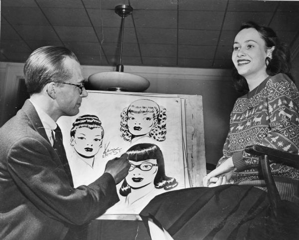 Cartoonist Ken Ernst sketching Badger Beauty Ruth Schmitt whom he selected to represent a new character in his comic strip "Mary Worth".