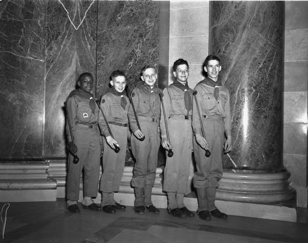 Five drum majors of the Four Lakes Council (Madison area) Boy Scout Drum and Bugle Corps. Left to right: Charles Harris, Charles Butler, James Berray, Stanley Stitgen, and Donald Martin.