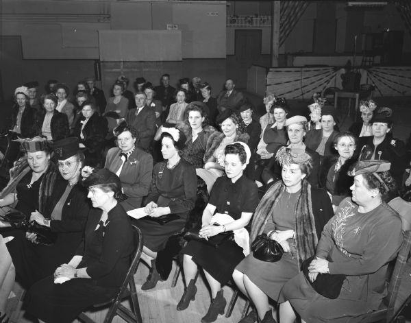Men and women working for control of cancer attend a meeting of the American Cancer Society.