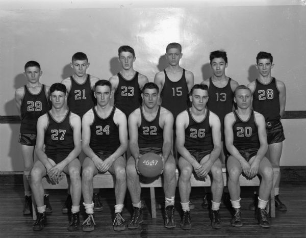 Group portrait of Mazomanie High School basketball team who were Tri-County League champions.