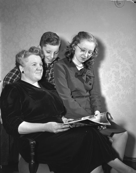 Newcomers to Madison are, from left to right: Mrs. Merrill R. (Lucy) Abbey, 2110 Fox Avenue; children Stuart ("Mickey") and Mary Ruth.
