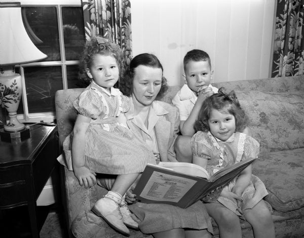 Mrs. F.I. (Betty Neef) Sanna and her three children, Susan (3), David (6), and Kathryn (5), are new residents of Maple Bluff, having moved from Minneapolis, Minnesota. Mr. Sanna is with Sanna Dairy Engineers.