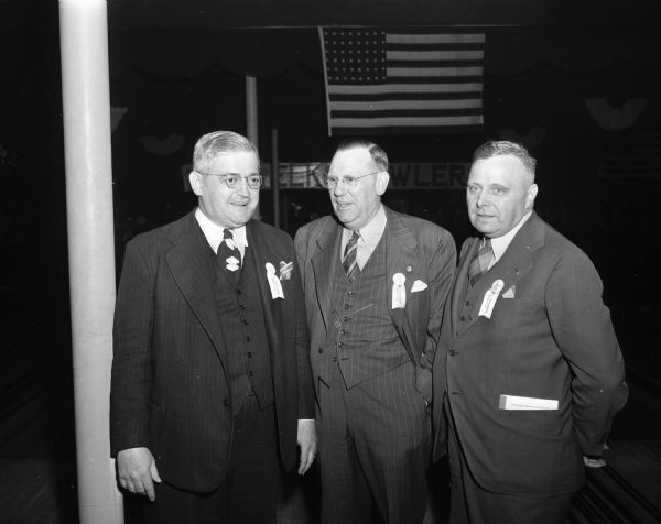Joseph F. Krizek, Berwyn, Illinois, an honorary life member of the Elks Bowling Association of America, is shown on the left with Ray Farness and Harold Lampert, who are members of the Elks tournament committee.