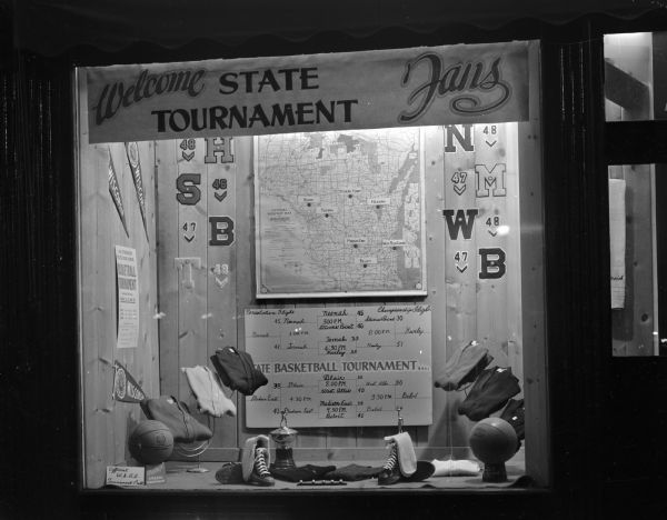 Wisconsin Felton Sporting Goods window display of state map and pairings chart for 1947 State Basketball Tournament. "Welcome State Tournament Fans."