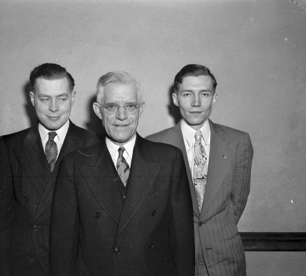 Roy M. McFee (center), and his two sons, John L. (left) and Paul H. (right), all lived at 2313 Maher Avenue, after receiving Master Mason degrees at the Masonic Temple.