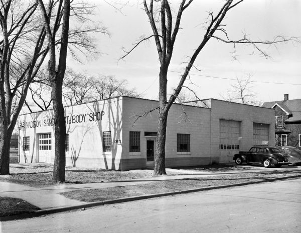 Exterior view of Madison Sandblast and Body Shop, 113 South Dickinson Street, located in back of the Gisholt Machine Company.