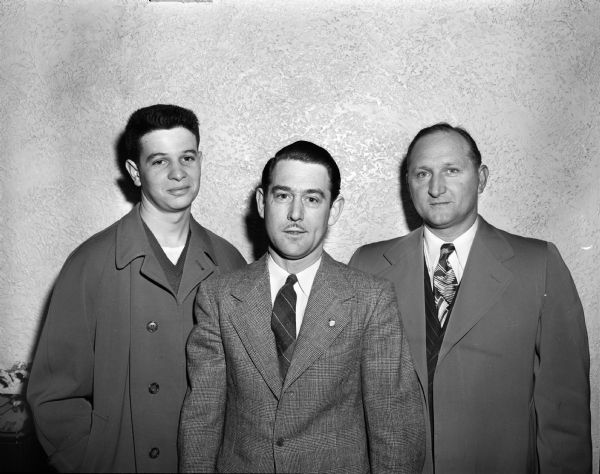 Three officials of the Nakoma Golf Course. From left are George Shiro, assistant golf pro; Urban H. Linden, manager; and George Vitense, golf pro.