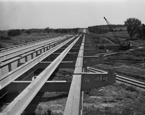 Highway 30 overpass under construction over the railroad tracks just east of the Sun Prairie Road (East Washington Avenue) junction.