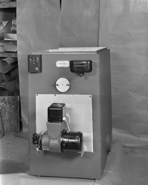 Oil burner on a Brandes furnace, manufactured by Brandes Heating Company, 2046 Winnebago Street.