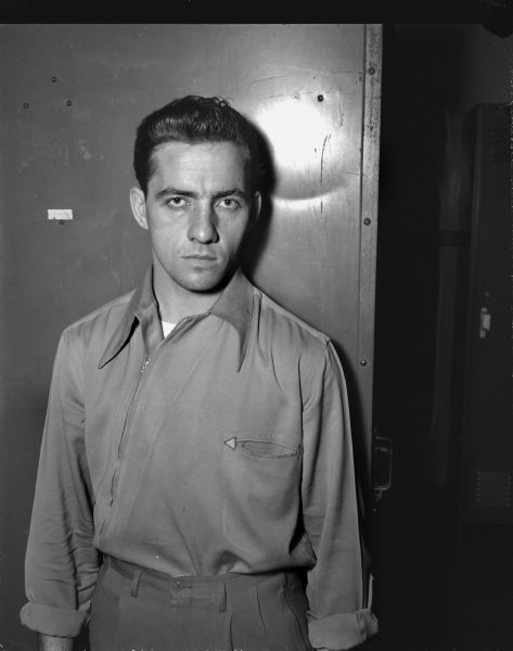 Max M. Feeney, Loraine Hotel robber, a parolee from Indiana, who was captured by Officer Raymond P. Kurth five minutes after the hold-up.