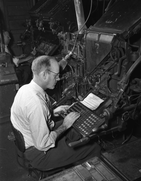 <i>Wisconsin State Journal</i> linotype operator at work.