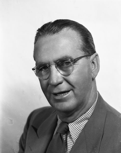 Portrait of Joseph L. "Roundy" Coughlin, sports columnist for the <i>Wisconsin State Journal</i>.