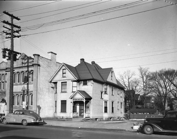 House at 622 University Avenue is the only survivor of the homes which housed some of Madison's early settlers. The house has had a number of owners, including Gottlieb Grimm, Hilar Flad, and Joseph Dunkel. Fifty-five years ago it replaced an older residence built on the site ninety years previously. 626 University Avenue building is next door on the left.