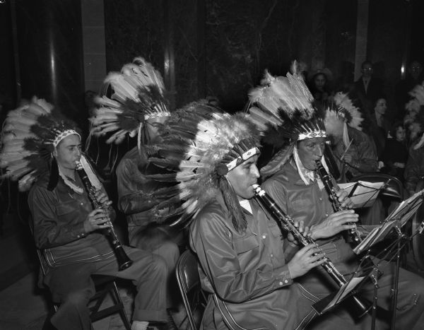 Menominee Indian Band playing at the Wisconsin Centennial Year Kick-off Ceremony in the Wisconsin State Capitol.  They played a one hour concert in the morning while spectators assembled for the Ceremony.