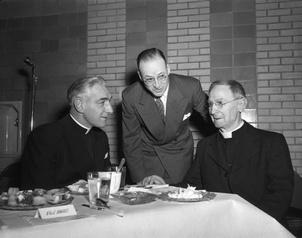 Pictured at the Mt. Horeb Chamber of Commerce 25th anniversary banquet are three clergymen who have been active in the organization. Left to right are: Rt. Reverend Monsignor Theodore Rohner, Beaver Dam; the Reverend Hector Gunderson, and the Reverend Theodore Thome.