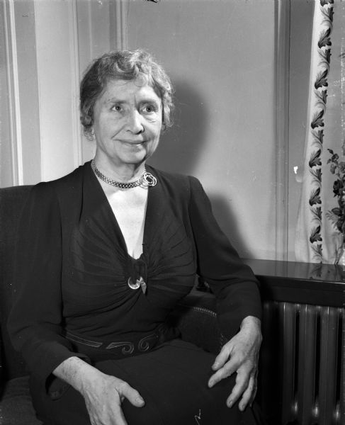 Portrait of Helen Keller, age 67, taken during her visit to Madison on a speaking tour.