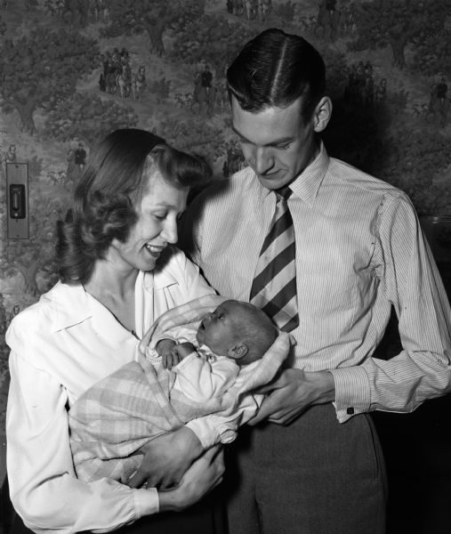 Ted LaValley, University of Wisconsin student and veteran, his wife Marie, and their 2 week old daughter JeanAnn. They are living in the University of Wisconsin Presidents's house, 130 North Prospect Avenue, as caretakers.