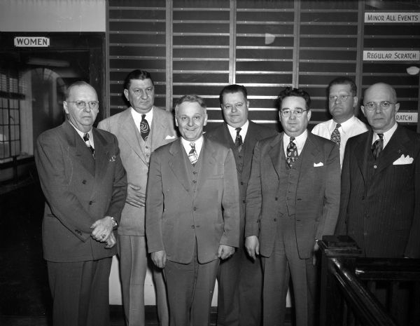 State Bowling Tournament opened by the Fauerbach Anniversary Squad, left to right: Clarence Jonen, Karl Fauerbach, E.N. Quinn, Don Huseby, Roman Moreth, William Fauerbach, and Bill Grant.