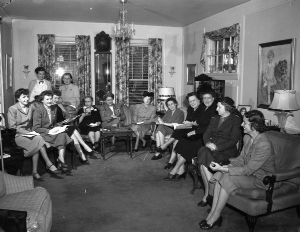 Campaign meetings for the support of Harold Stassen were promoted by the Citizens Committee for Stassen at the home of Mrs. Clifford (Shirley) Mathys, and included are Mrs. Walter Stebbins, Mrs. Gilman Page, Helene Eby, Mrs. Mary Mathys, Mrs. John (Glen) Wise, Mrs. Wesley Walker, Mrs. Austin (Florence) Lillegren, Mrs. Ronald (Opal) Rook,  Mrs. Helen Eby, and Helen Horr(?) and Mrs. Richard Gale, Minneapolis; standing in rear, Mrs. Guy Martin and Mrs. Mathys.
