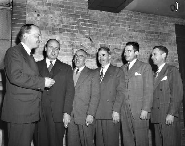 Harold E. Stassen (left), in Fort Atkinson, visiting with left to right: W.D. Hoard, publisher; Jefferson County Sheriff R.J. Gibson; James LeChance, Palmyra, Jefferson County GOP Chairman; Richard Smith, Jefferson, Stassen-pledged delegate; and Francis Garity, Jefferson County District Attorney.